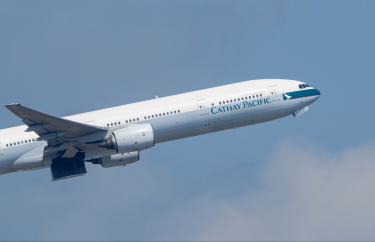 passenger jet takes off from hong kong international airport